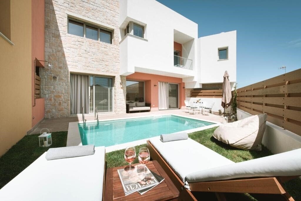 Отель Tessera Villas Collection 4*