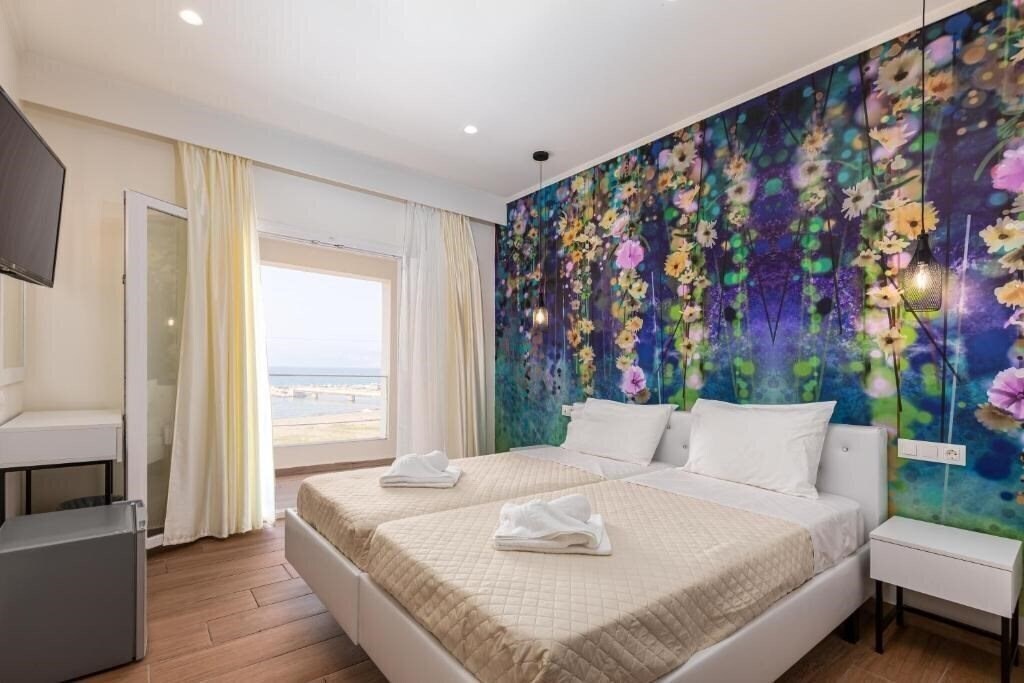 Фото Aqua Luxury Suites by Estia Roda 3*