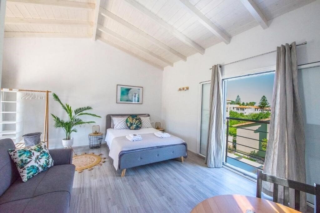 Фото Acharavi Beach Villa 4*