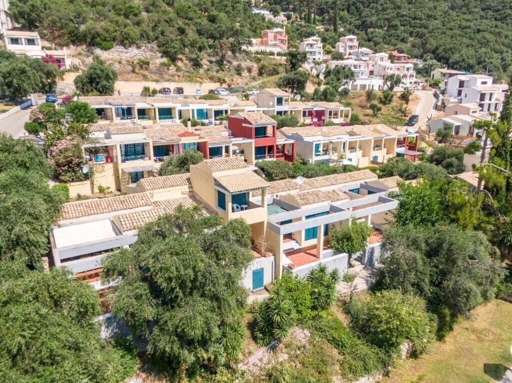Фотографія Barbati Beach Apartments 4*