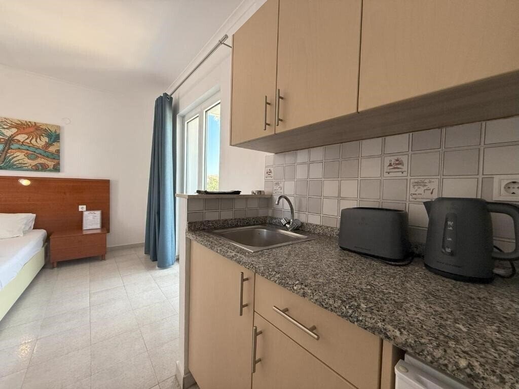 Фотографія Elga Hotel & Apartments 2*