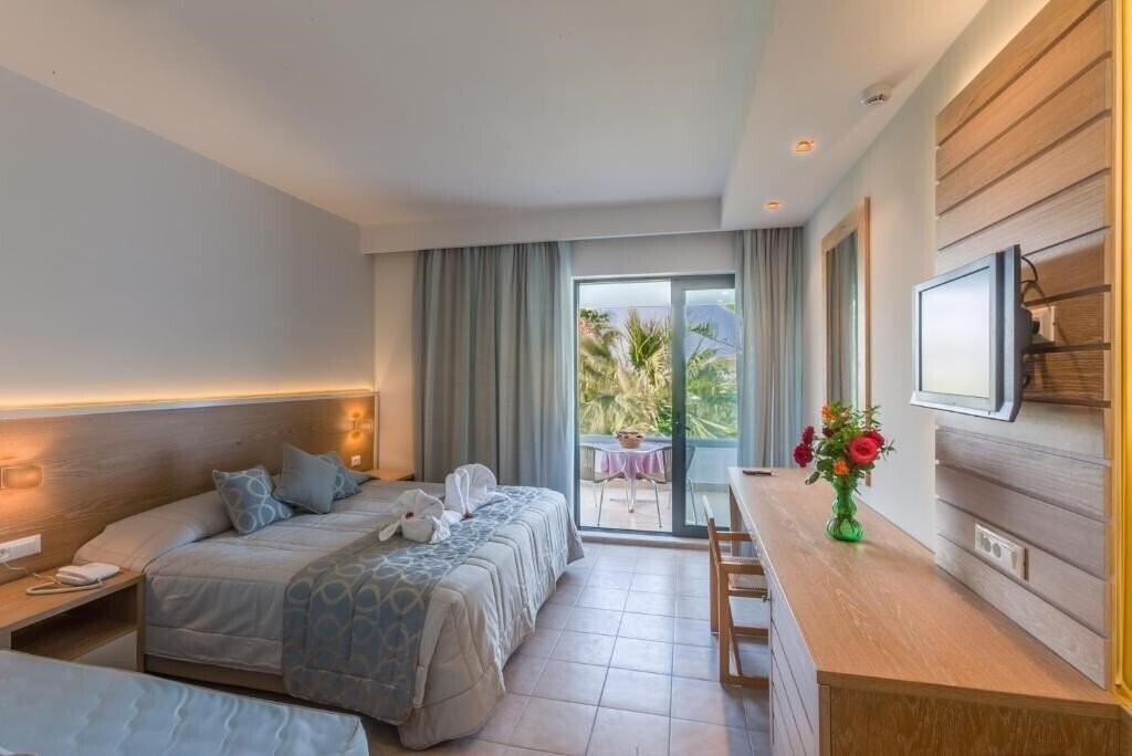 Фото Tigaki Beach 4*