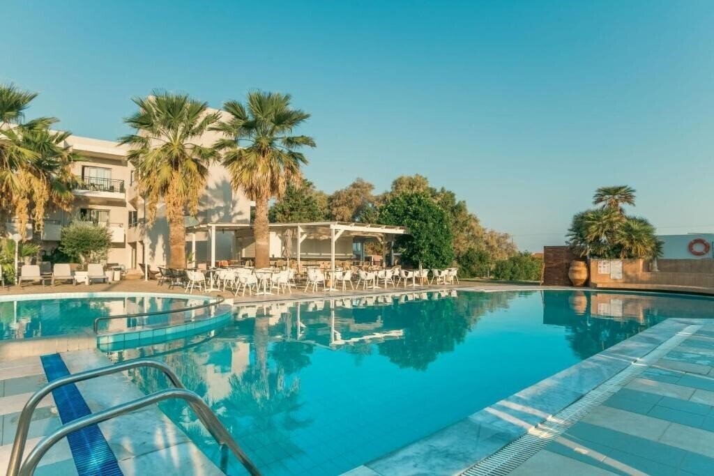 Фото Gouves Bay 4*