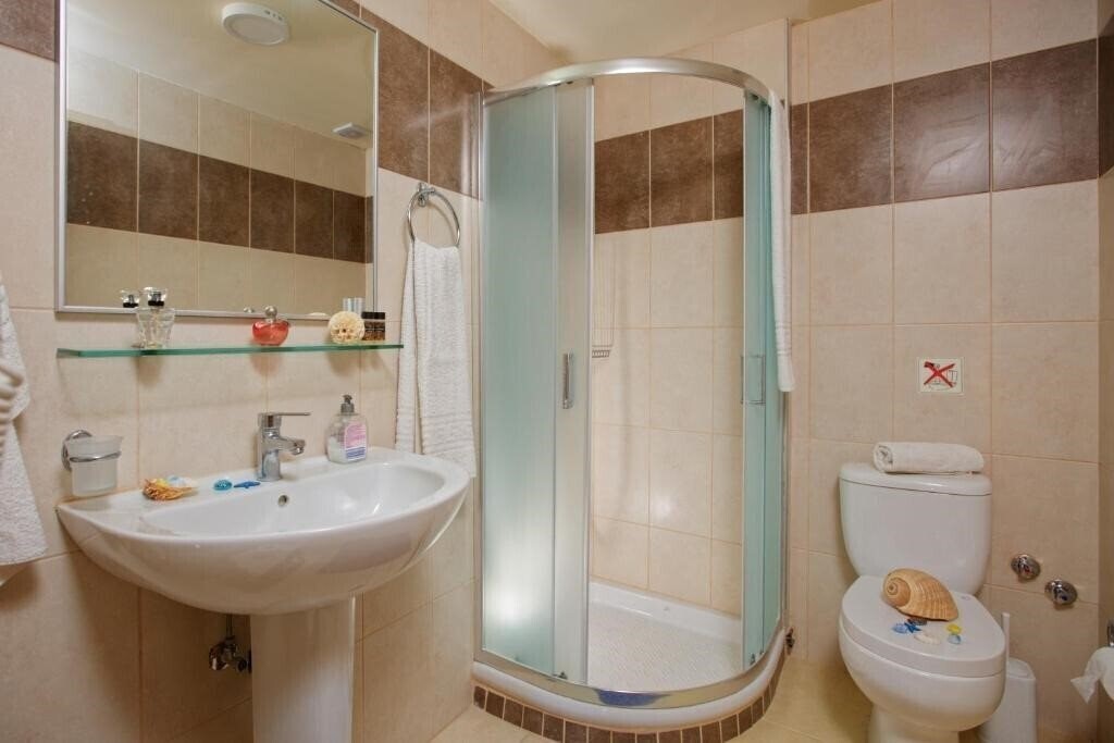 Фотографія Fotis Apartments апартаменты