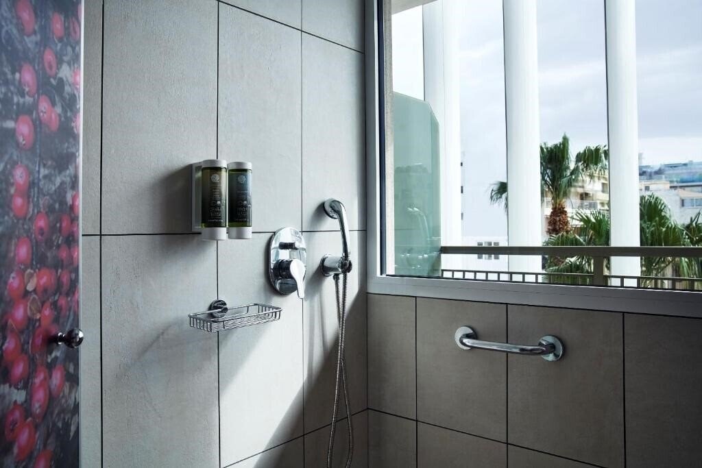 Фотографія Olive Green Hotel 4*