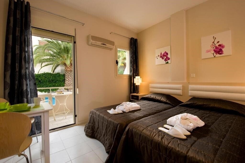 Фотографія Axos Hotel Rethymno 3*