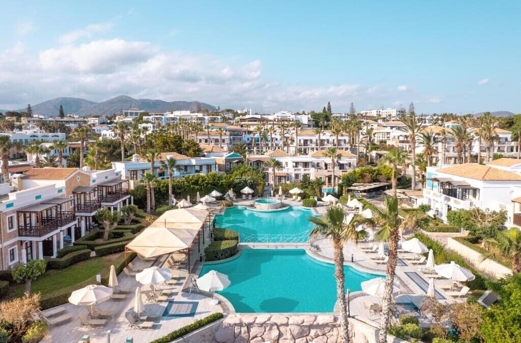 Отель Mitsis Royal Mare 5*