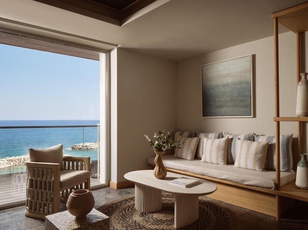 Фото The Royal Blue A Luxury Beach Resort 5*