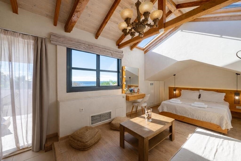 Фотографія Panellinion Luxury Rooms Апартаменты апартаменты