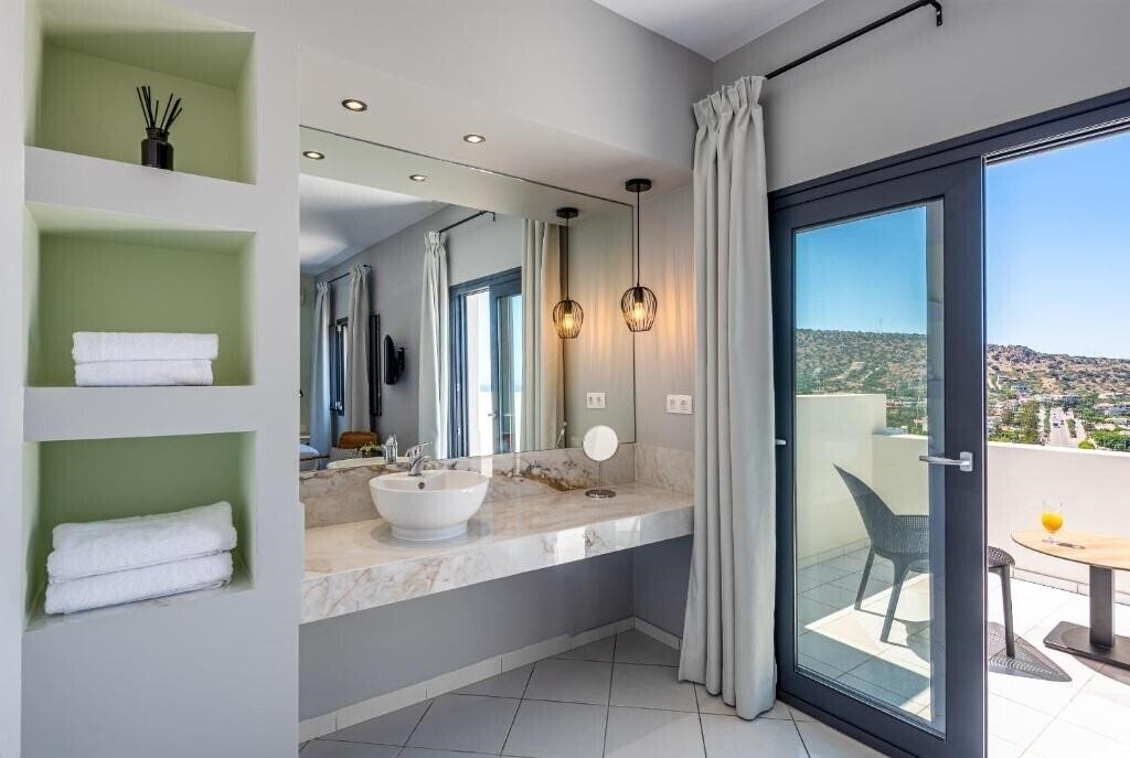 Фото Minois Boutique Hotel 3*