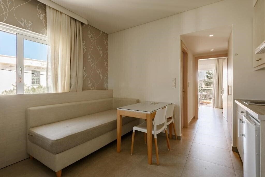 Фото Poseidon Studios & Apartments 3*