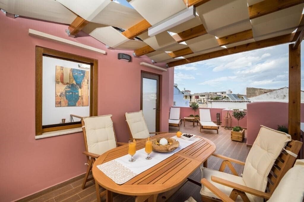 Отель Evlimeni Suites 4*