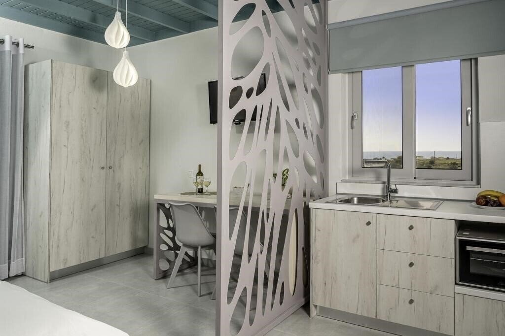 Фото Paradisos Studios & Apartments 3*