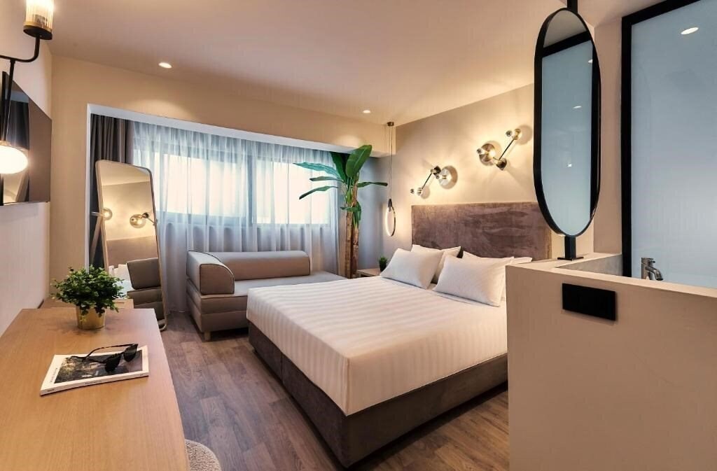 Фото Enorme Epavli Urban Living 4*