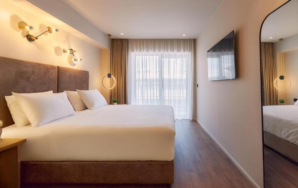 Фотография Enorme Epavli Urban Living 4*