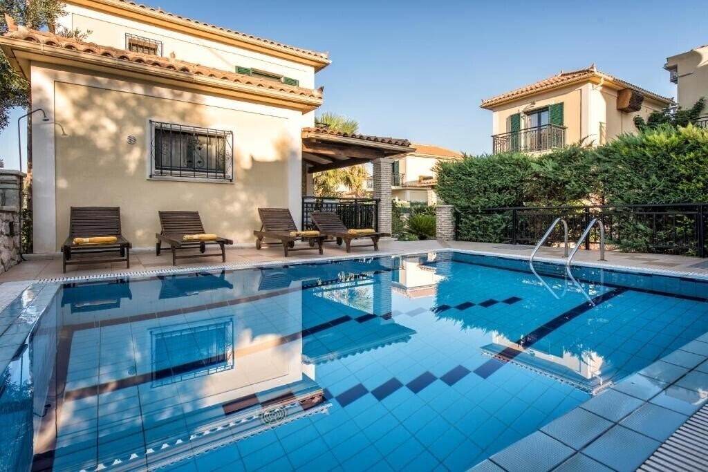 Отель Kookis Village 4*