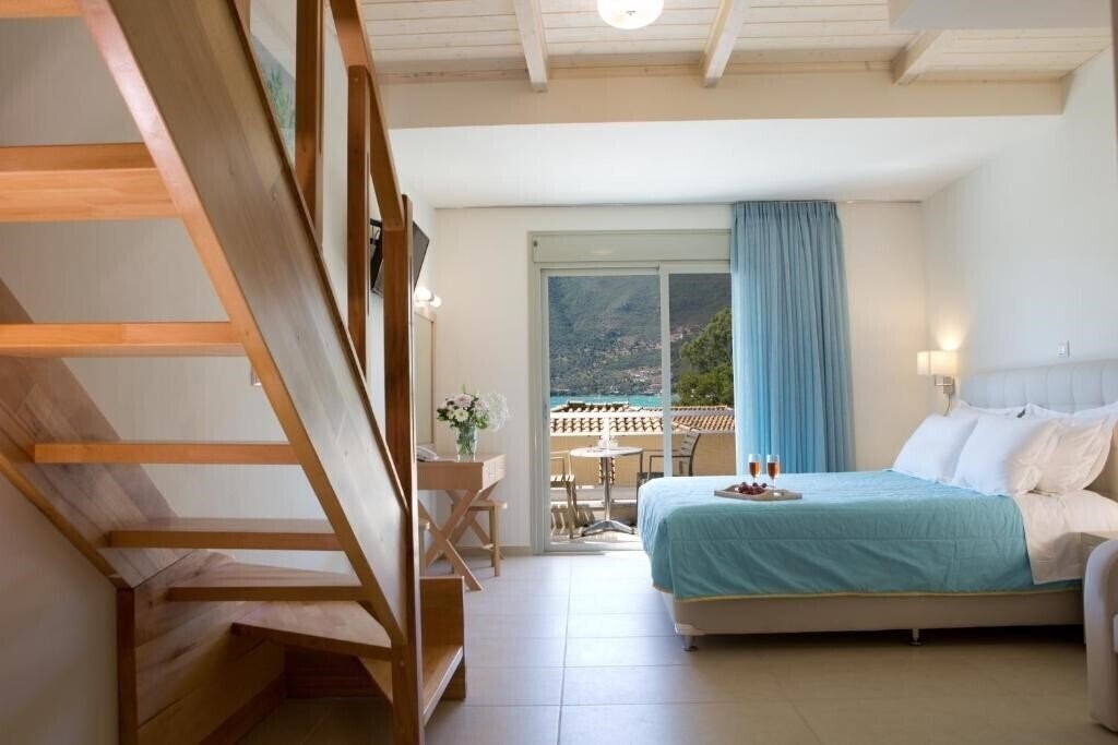 Фотографія Grand Theoni Suites & SPA 4*