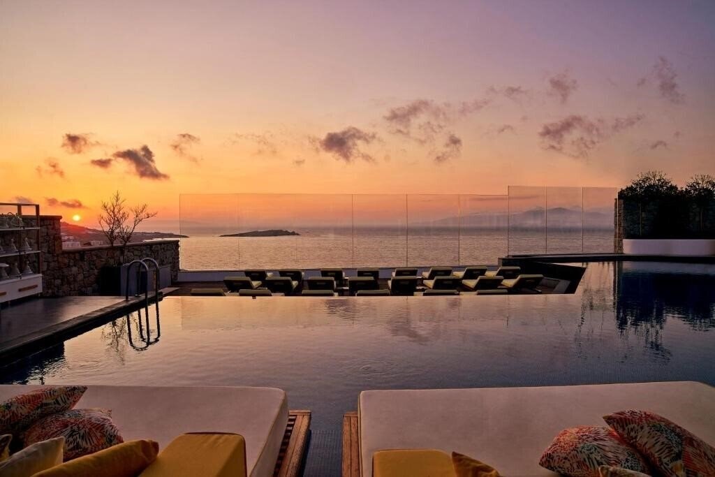 Отель Myconian Korali Relais & Chateaux 5*