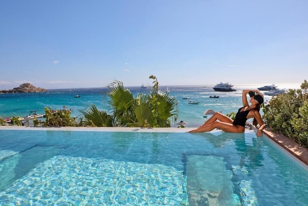 Фото Mykonos Dove Beachfront 5*