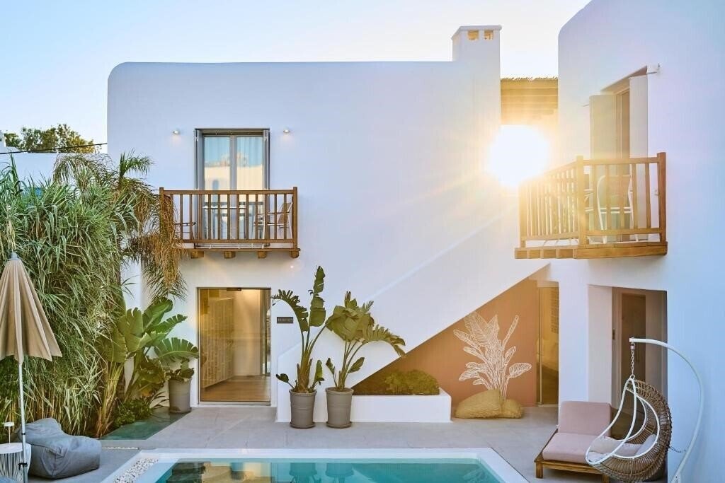 Отель Adorno Beach Hotel & Suites 4*