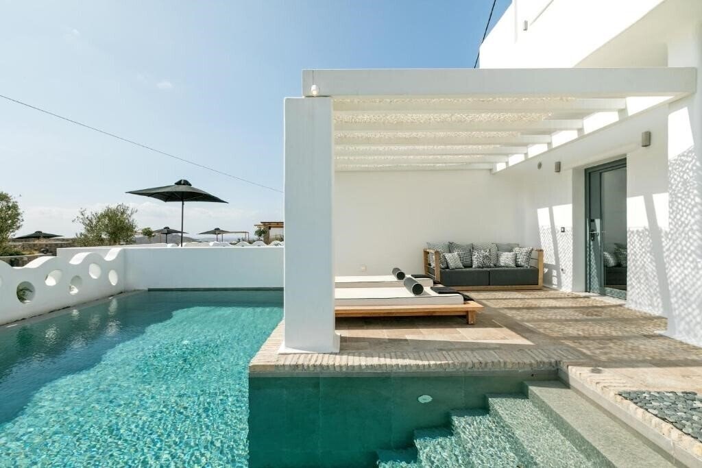 Фото Portes Mykonos Suites & Villas 4*