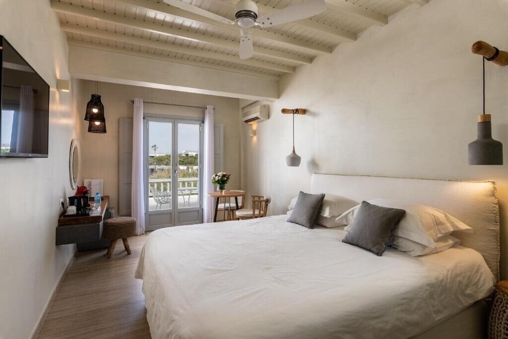 Отель Poseidon Hotel & Suites 4*