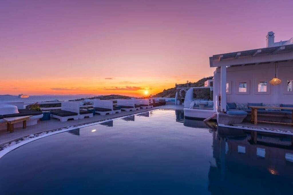 Фото Flaskos Suites 4*