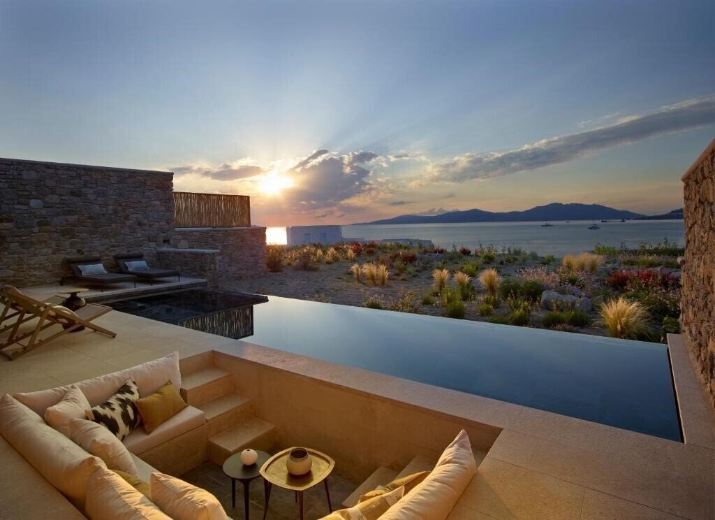 Отель Bonzoe Suites & Villas 4*