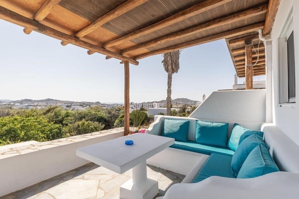 Отель Mykonian Breeze 5*