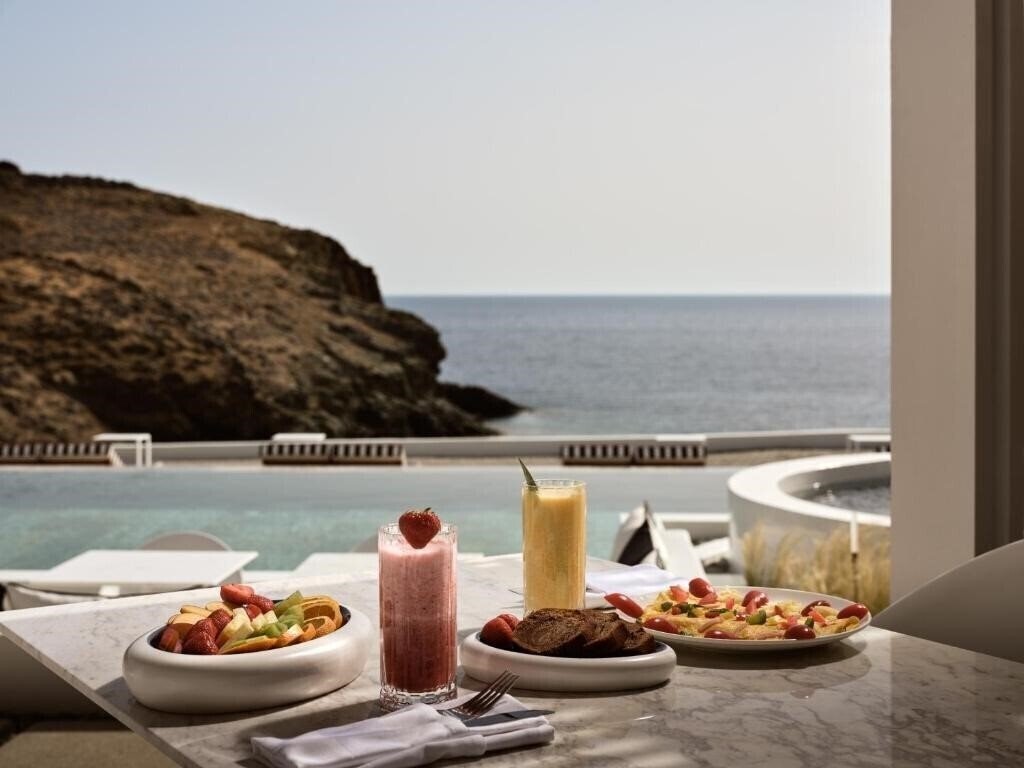 Фото Semeli Coast Curio Collection by Hilton 5*