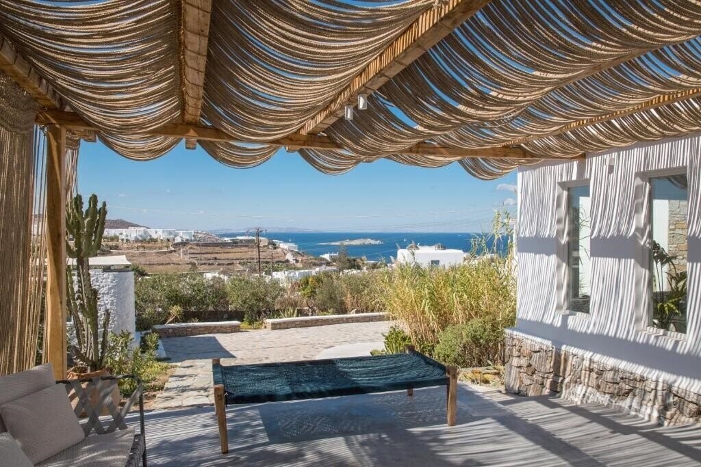Фото Ostraco Suites 4*
