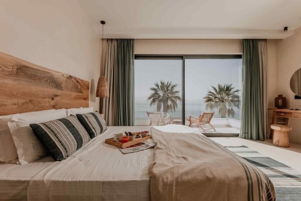 Изображение Ostrako Beachside Suites 4*