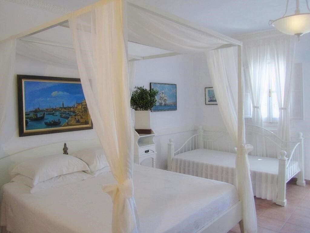 Фото Porto Scoutari Romantic Hotel Patmos 3*