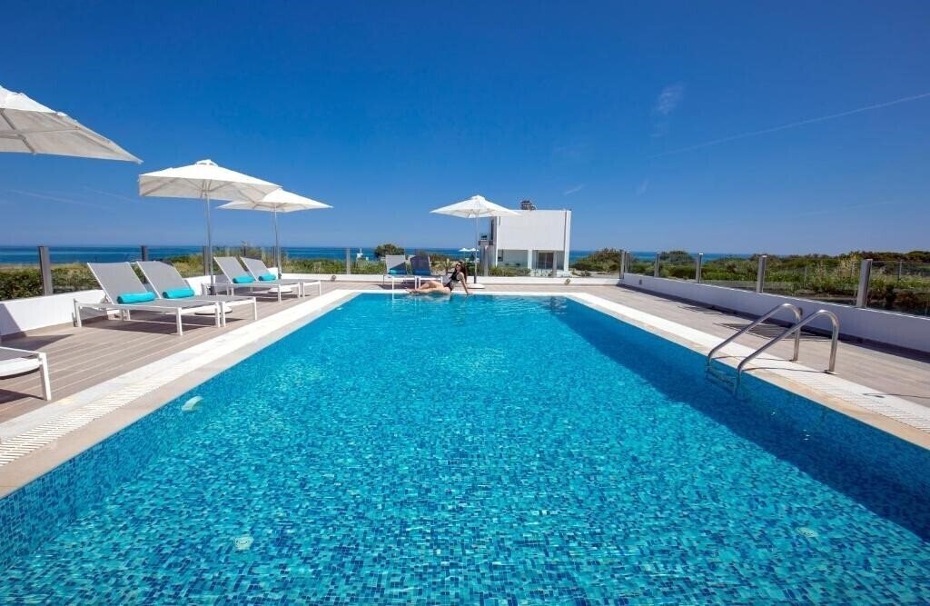 Фото Aegean Horizon Beachfront Villas 5*