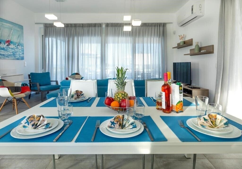 Фото Aegean Horizon Beachfront Villas 5*