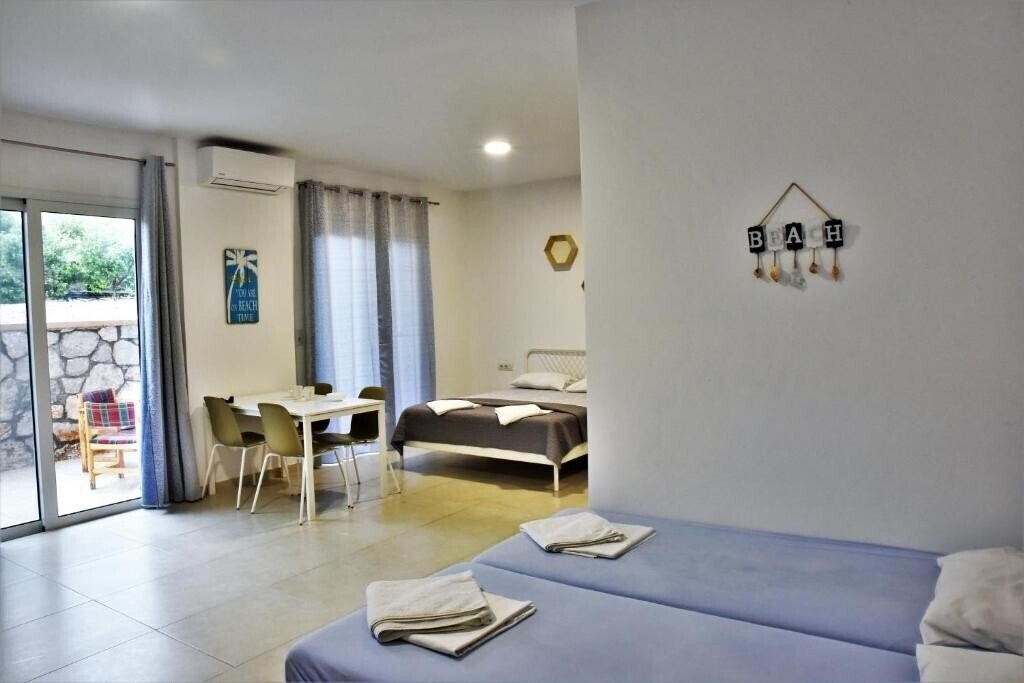 Фото Telhinis Hotel 2*