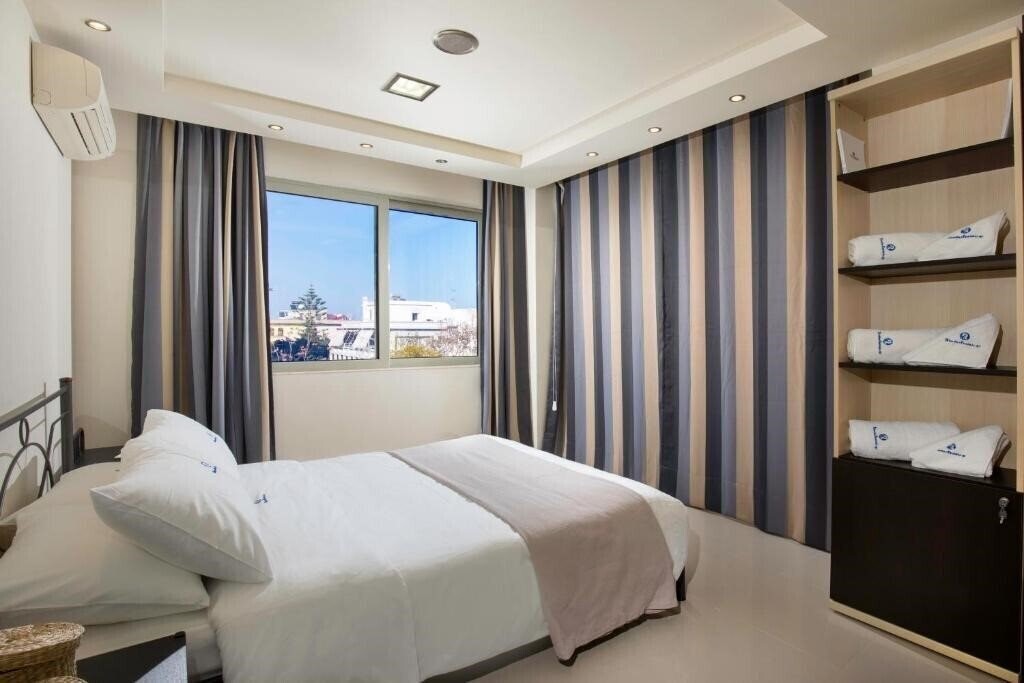Фото Rhodes Central Suite 4*