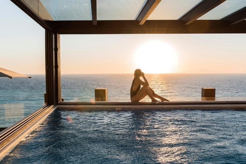 Фото Bellevue On The Beach Suites 5*