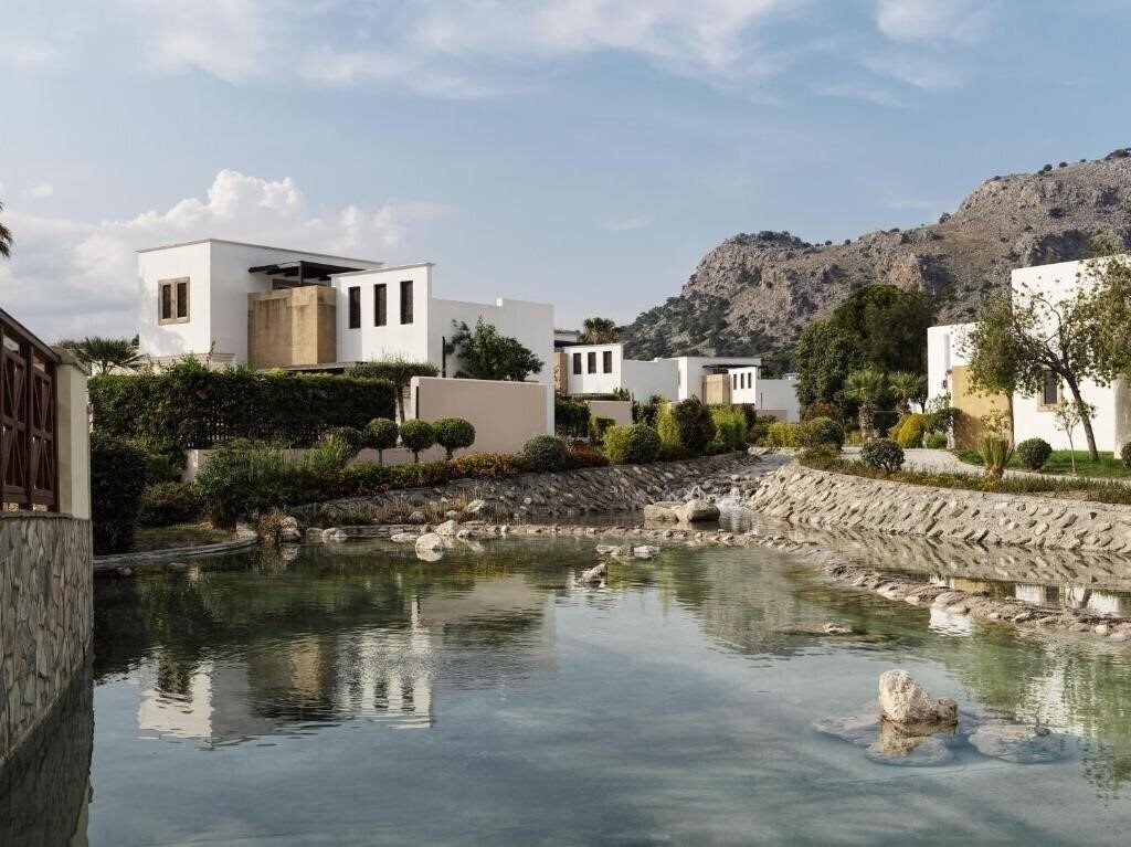 Фото Aulus Lindos Rhodes Resort, Curio Collection by Hilton 5*