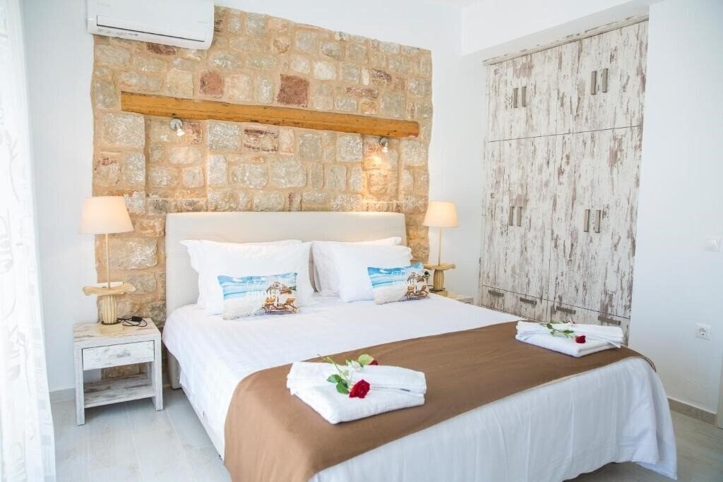 Отель Haraki Stone Apartments 3*