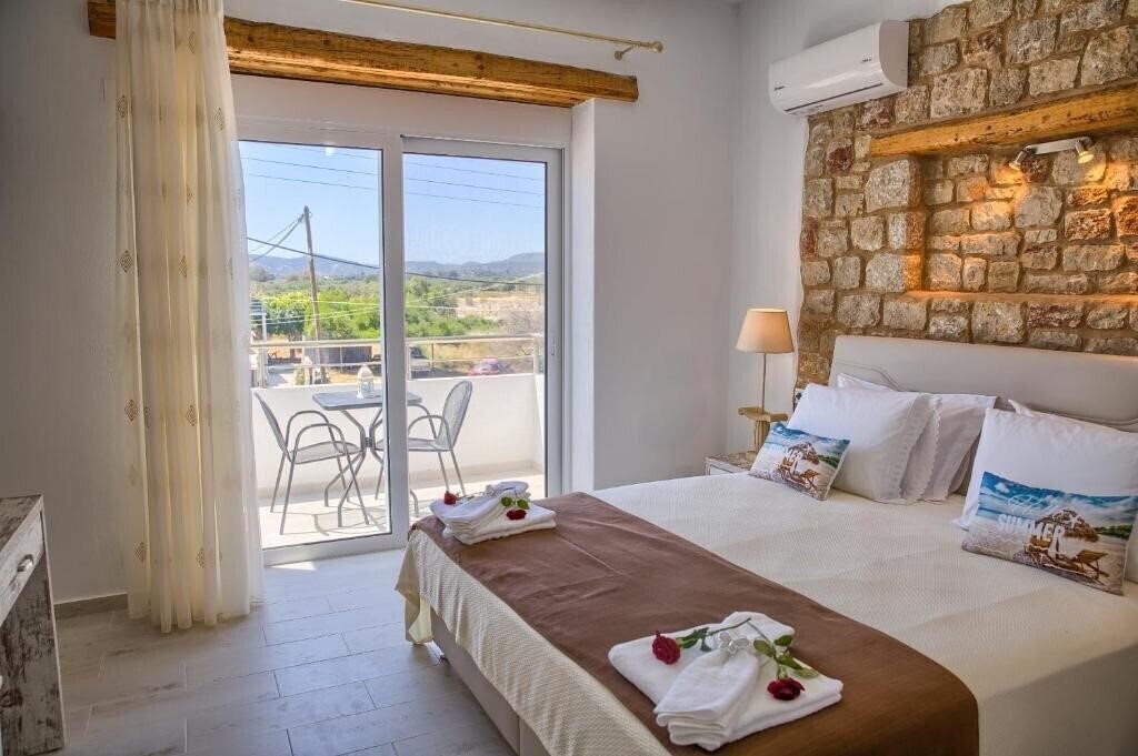 Фото Haraki Stone Apartments 3*