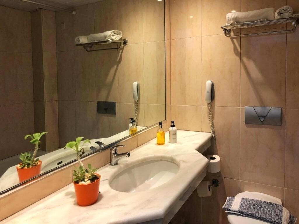 Фотография Caravel Apartment Hotel 3*