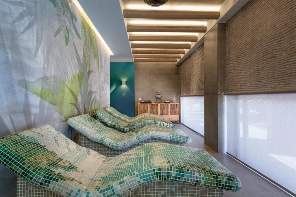 Фото Porto Angeli Beach Resort 5*