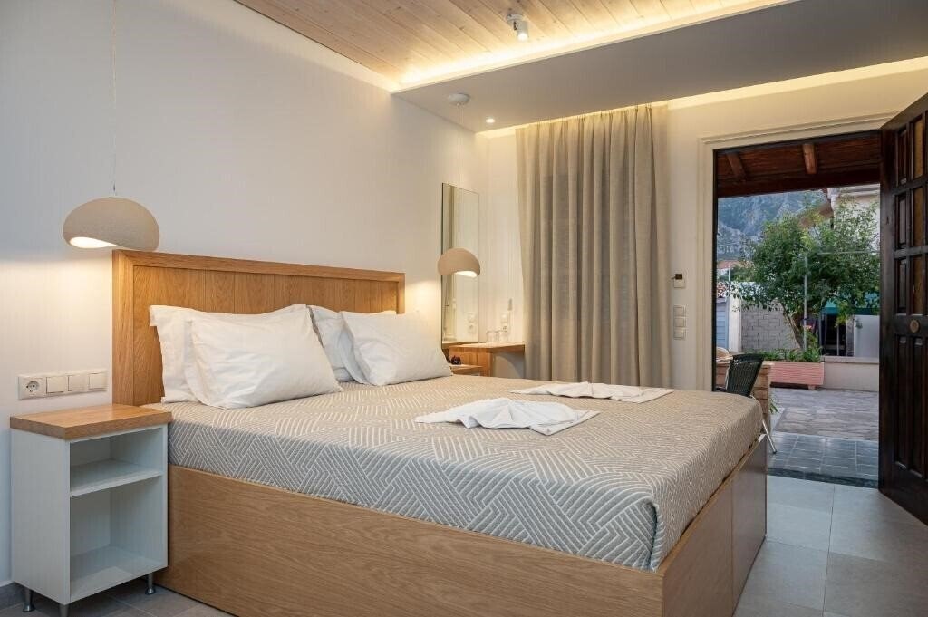 Фото Athena Beach (Kokkari) 3*