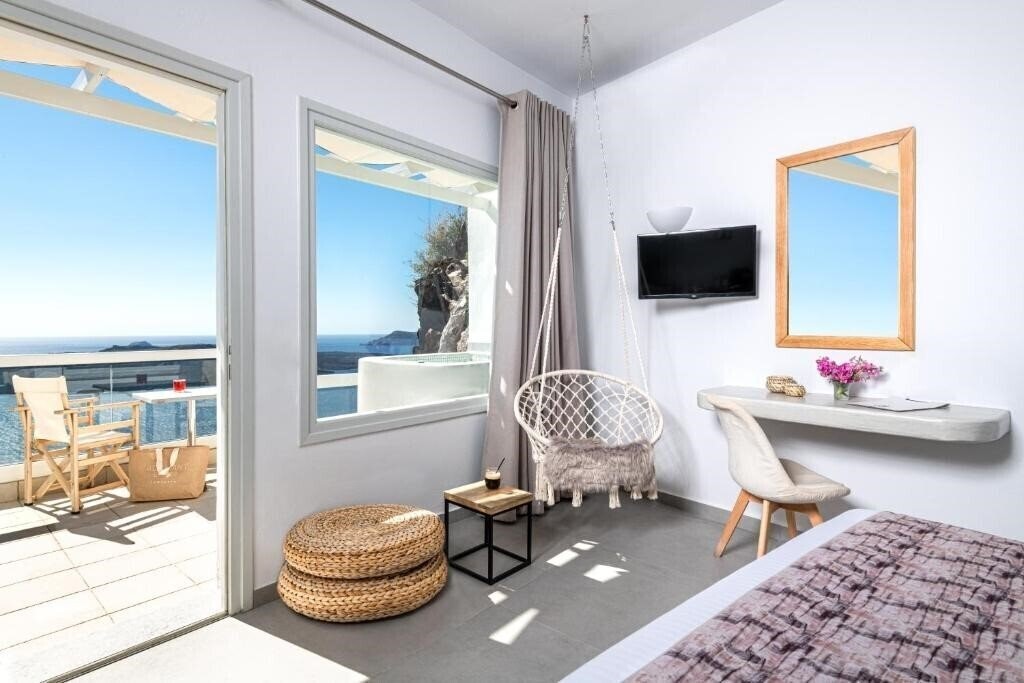 Фотографія Adamant Suites 4*