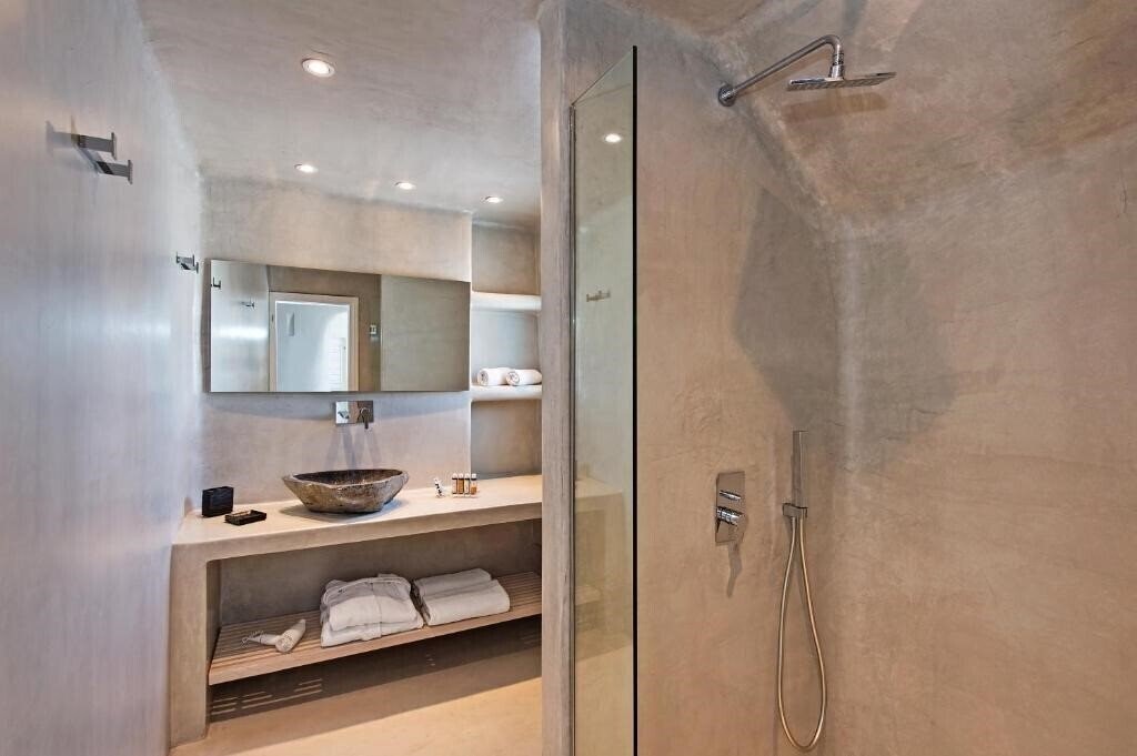 Фото Porto Fira Suites 4*