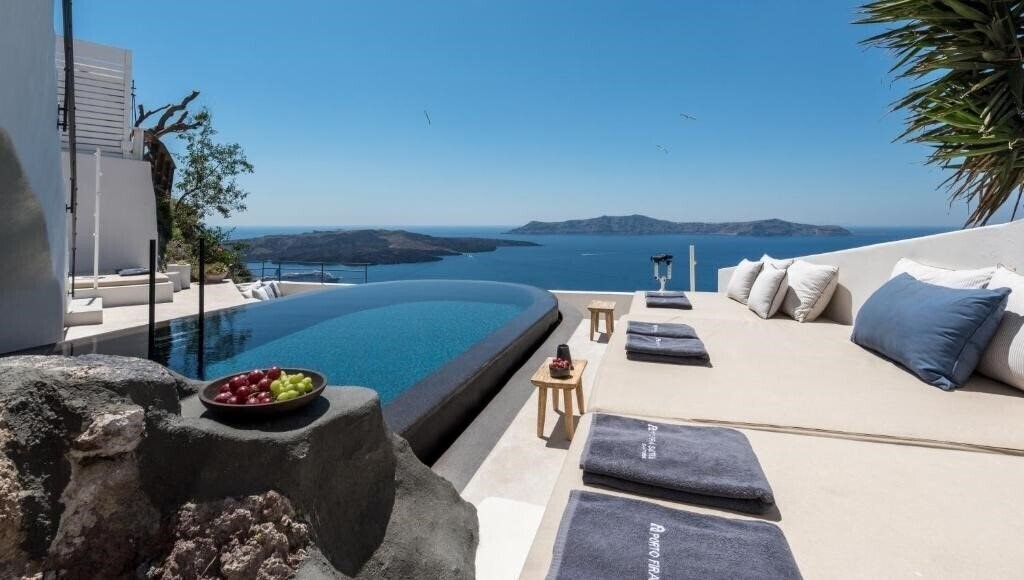 Фотографія Porto Fira Suites 4*