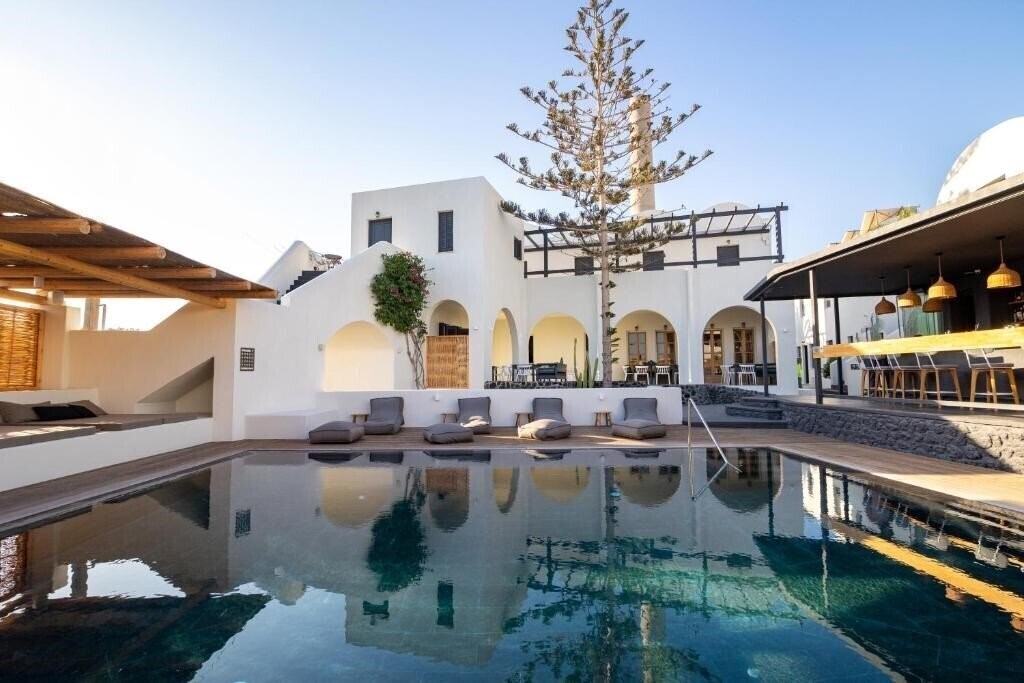 Фотографія Scorpios Beach Apartments & Studios 4*