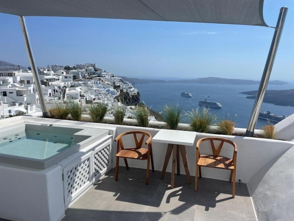 Фотографія Nomikos Villas 4*