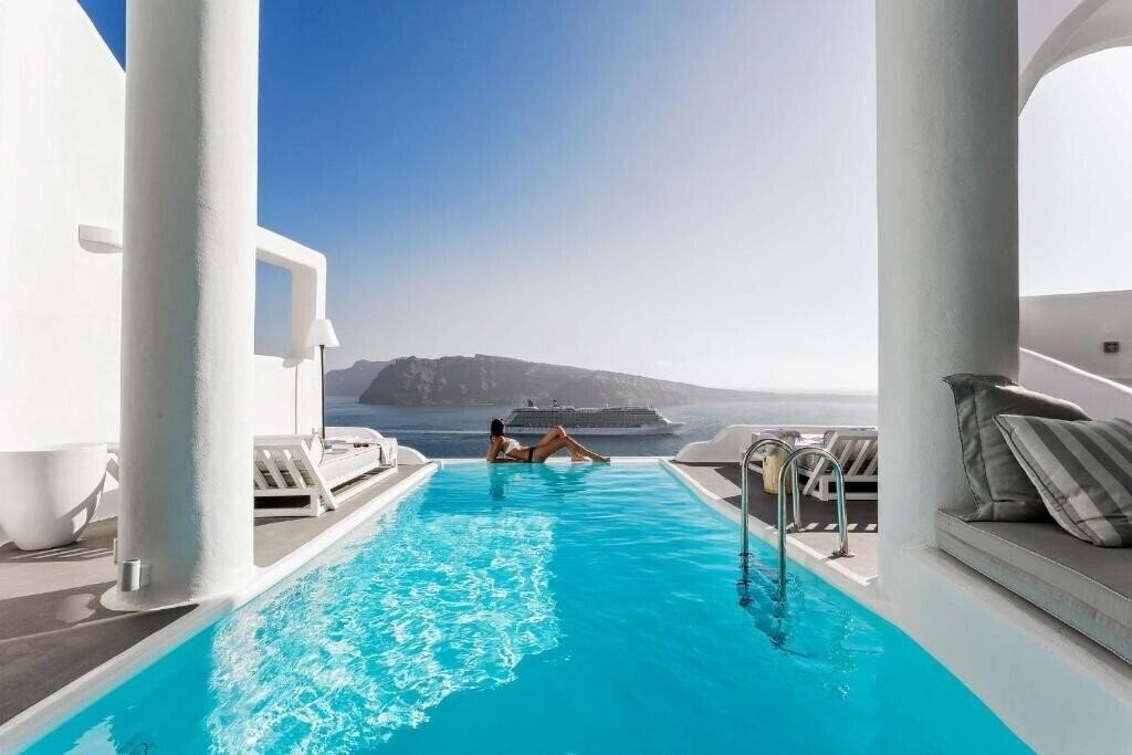 Фото Charisma Suites 4*